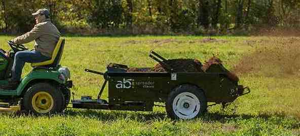 spreaders for lawn mowers or