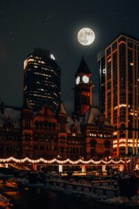 City buildings mysterious look with moon background